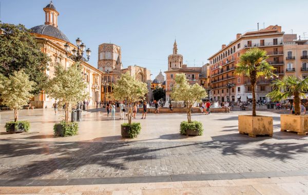 View in the Virgen square with cathedral in the centre of Valencia city during the sunny day in Spain